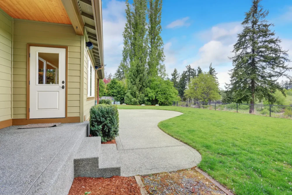 Exposed aggregate concrete porch, steps, & patio 