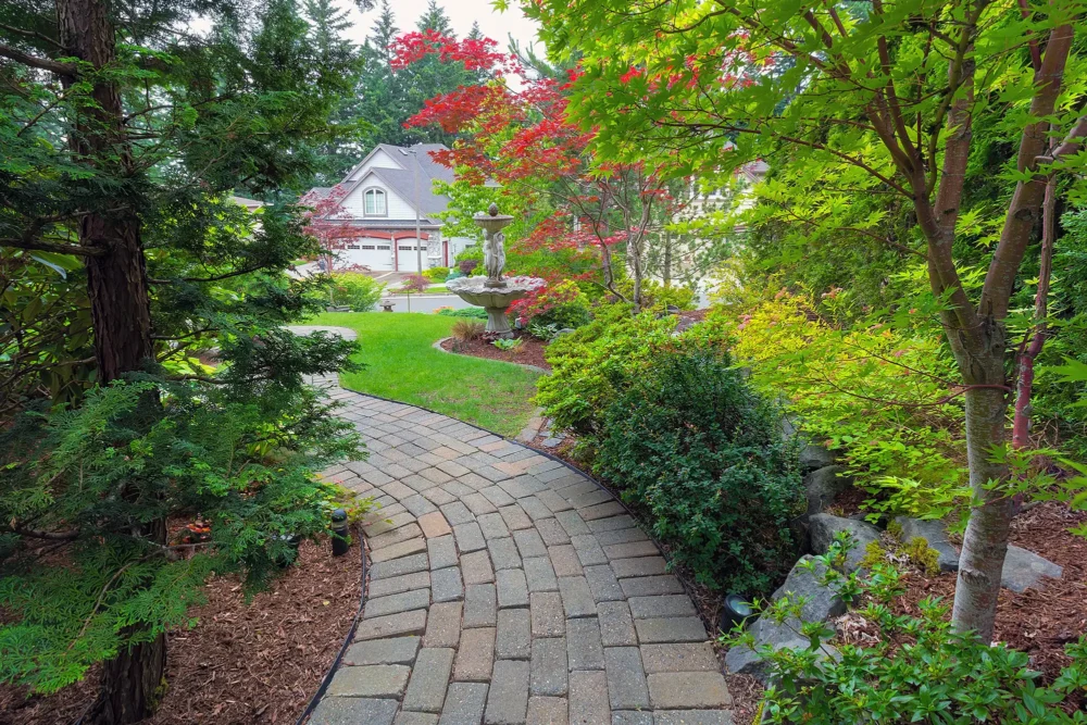 Garden path built with concrete pavers