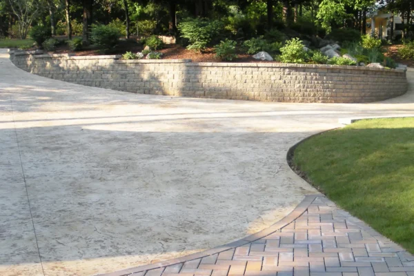 Driveway Replacement showing seamless texture skin pattern for the stamped concrete and pavers used on the apron